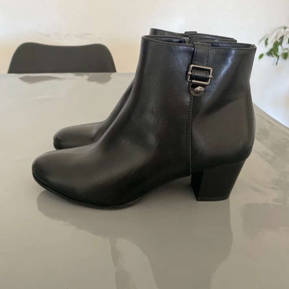 Sleek Black Ankle Boots with Buckle Detail